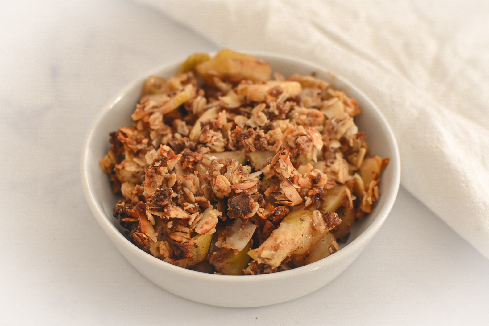 healthy apple crisp in bowl