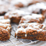 Spiced hermit bar cookies on a rack