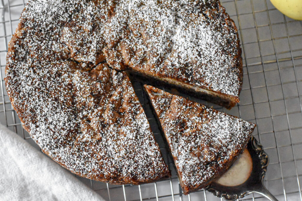 Tender and moist apple spice snacking cake on a cooling rack