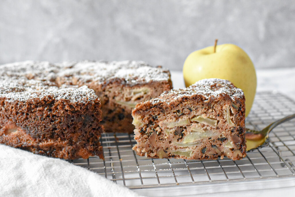 Tender and moist apple spice snacking cake on a cooling rack